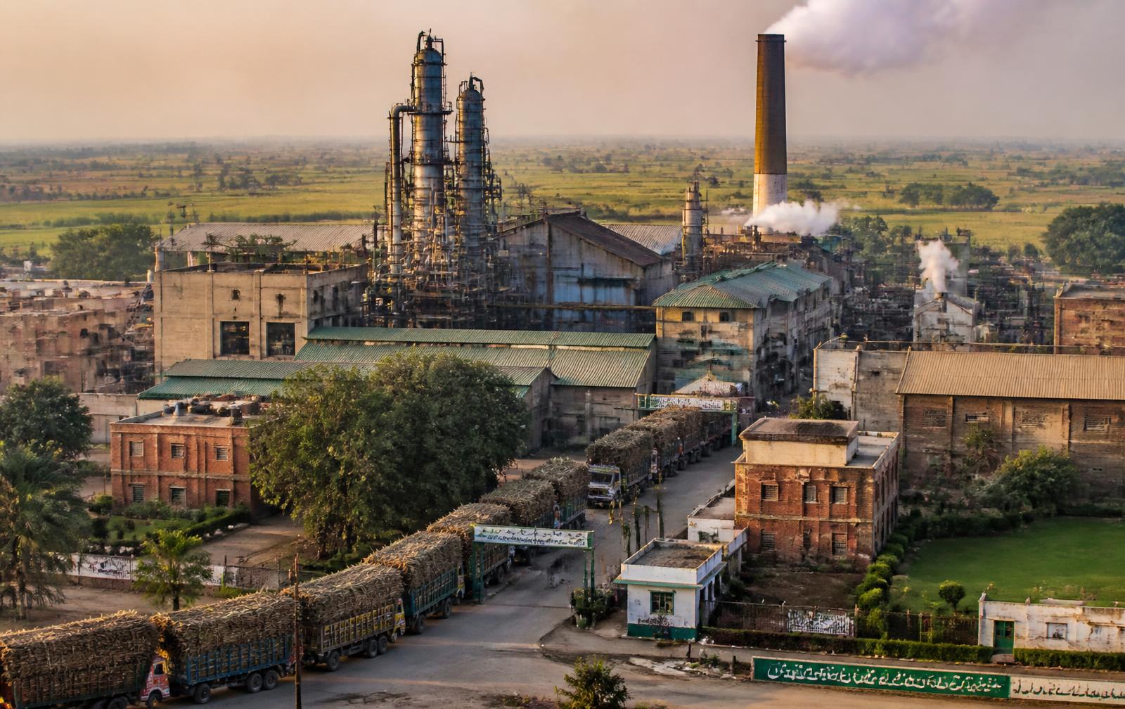 Sugar mill complex in rural Punjab, Pakistan at golden hour