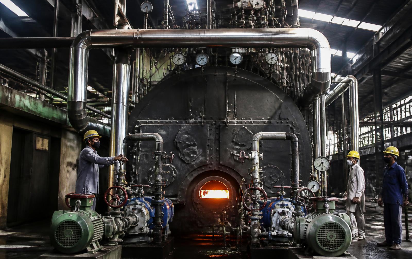 Bagasse fired boiler house with feed water pumps